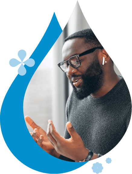 A man presenting in an online meeting